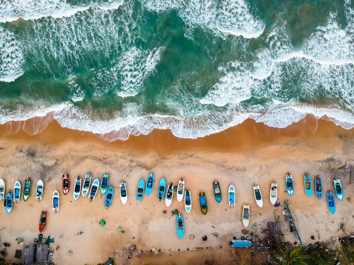 aerial photography of boats on shore