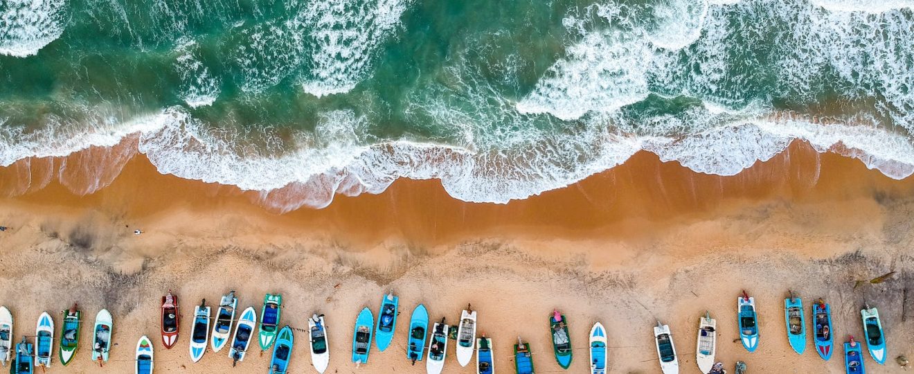 aerial photography of boats on shore